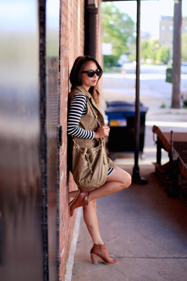 french connection striped dress, cognac booties, utility vest, prada cat eye sunglasses