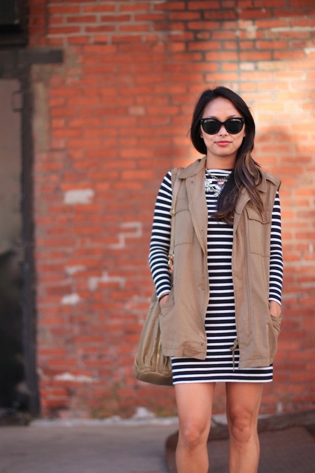 french connection striped dress, cognac booties, utility vest, prada cat eye sunglasses