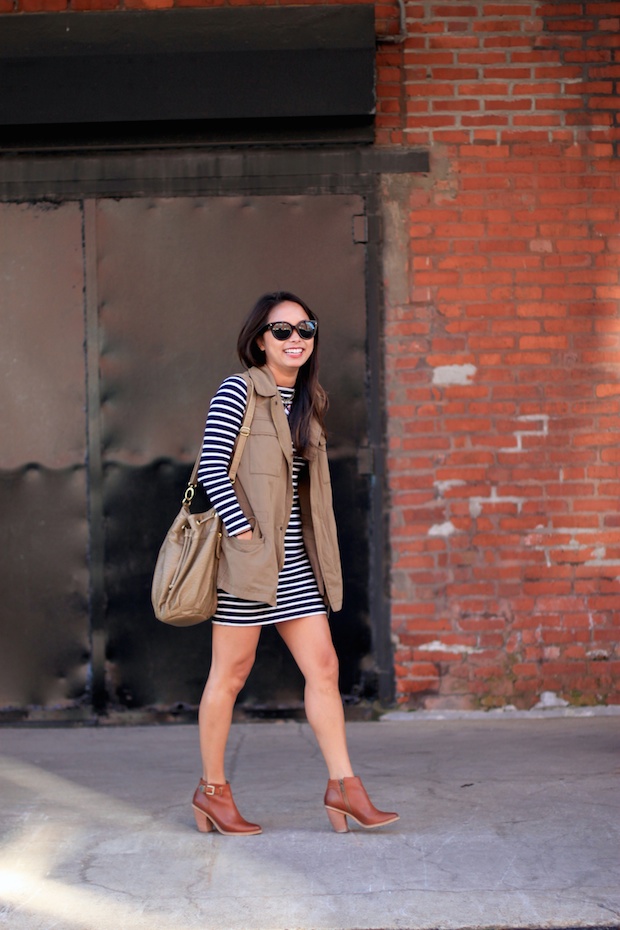 french connection striped dress, cognac booties, utility vest, prada cat eye sunglasses