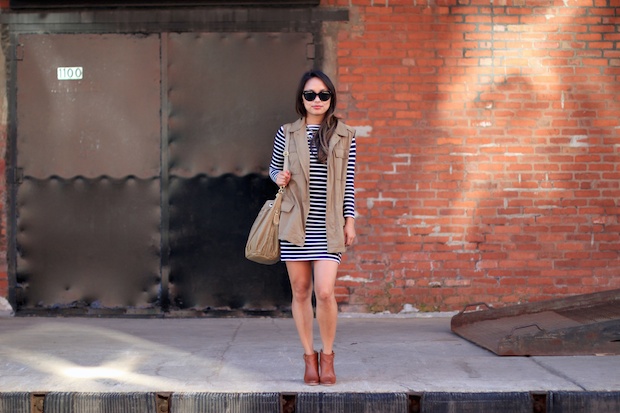 french connection striped dress, cognac booties, utility vest, prada cat eye sunglasses