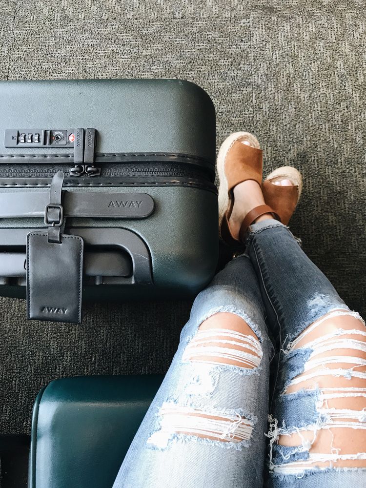 away suitcase, away travel, how to pack a carry on bag, tips for packing a carry on bag